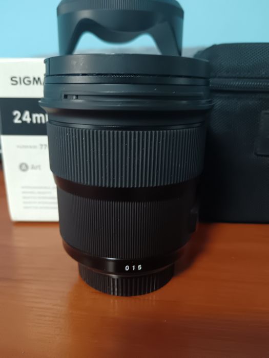 Продавам обектив Sigma 24mm f1.4 DG HSM Art за Никон