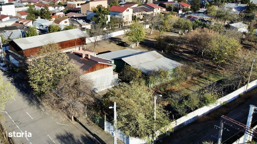 teren intravilan + clădiri industriale + casă rezidențială