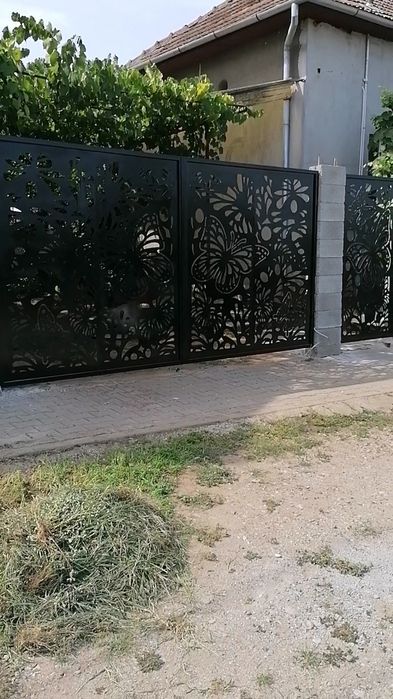 Confecții metalice. Porți,balustrade,copertine din inox și fier forjat