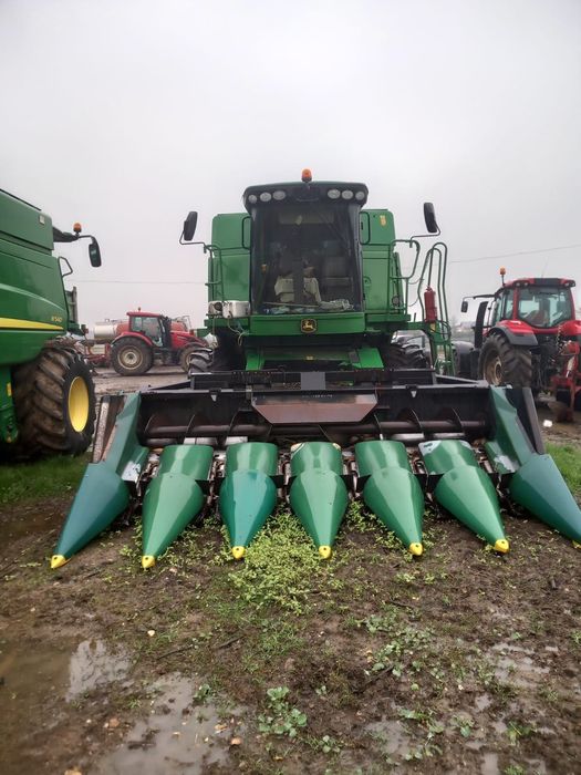 vând combina John Deere W540