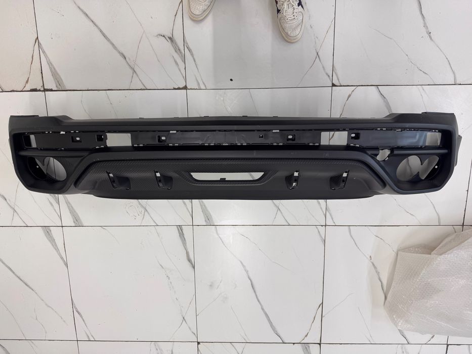 Задний бампер нижний часть Geely Coolray