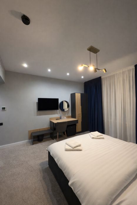 Elmax Aparthotel ofera camere in regim hotelier