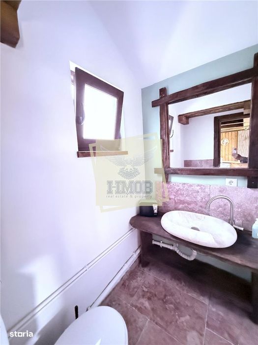 Casa ultracentrala complet renovata 6 camere 3 bai Cisnadioara