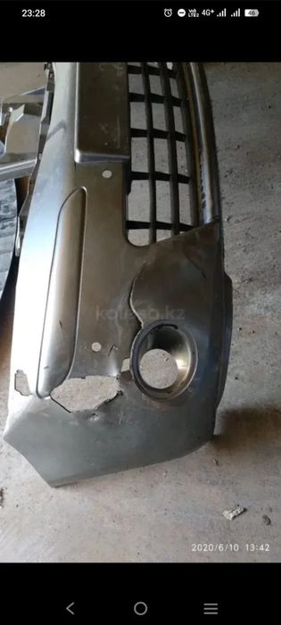 Бампер передний Nissan Note