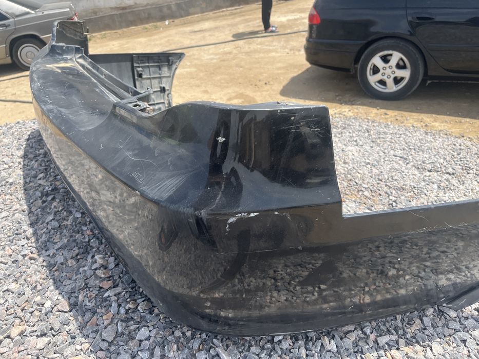 Бампер нексия задныйе