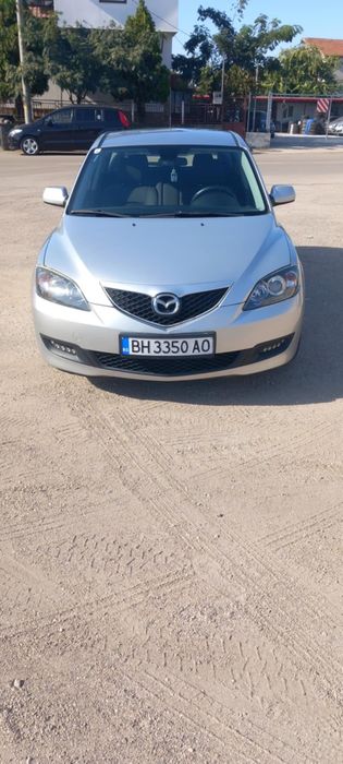 Автомобил Мазда 3
