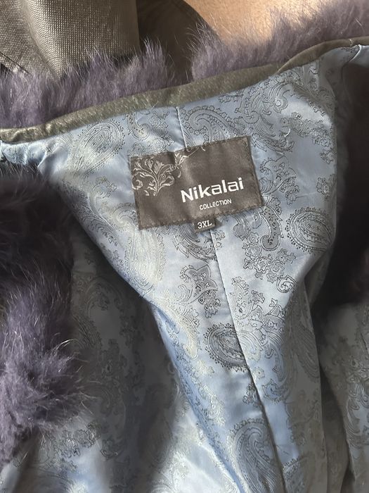 Продам меховую желетку