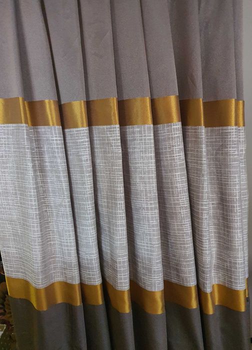 Завеси два броя 75 лева.