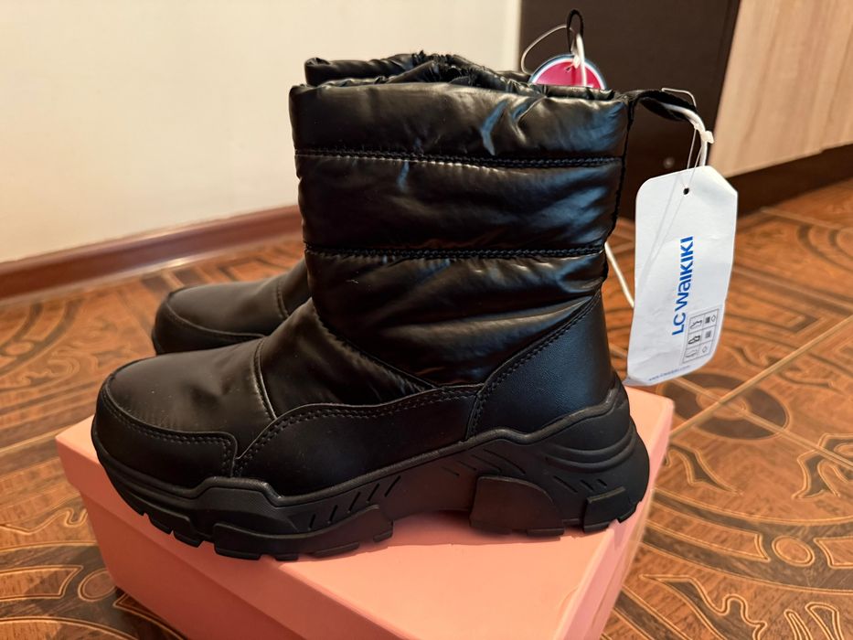 Продам женские сапоги