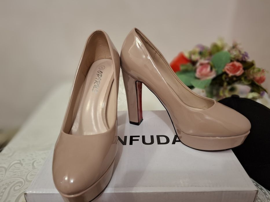 Ayollar tuflisi Sifatli