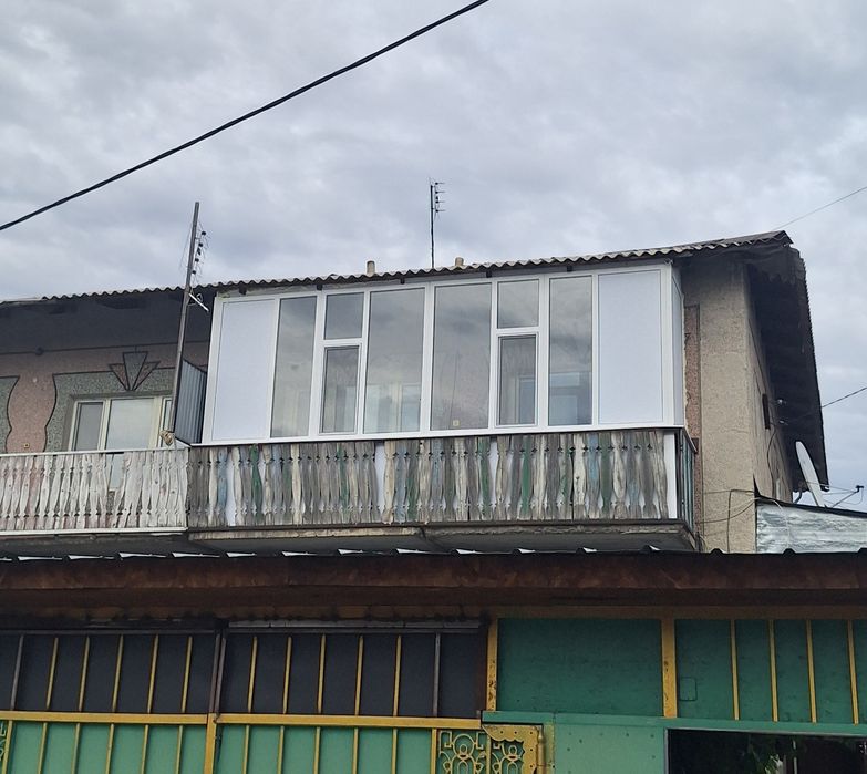 Пластиковые окна двери балконы Текели