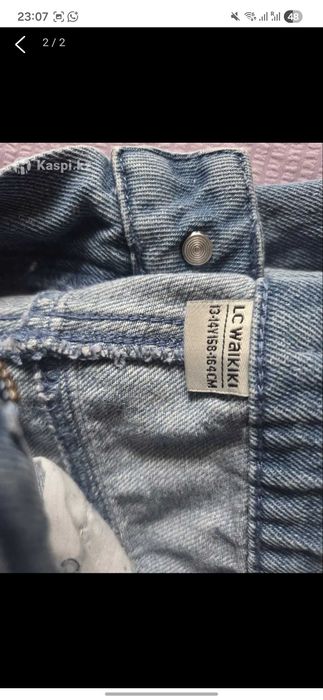 Новые джинсовые брюки