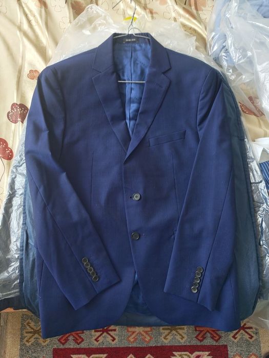 Мужские костюмы б/у