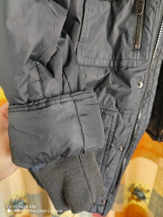 Продам куртку черного цвета на мальчика