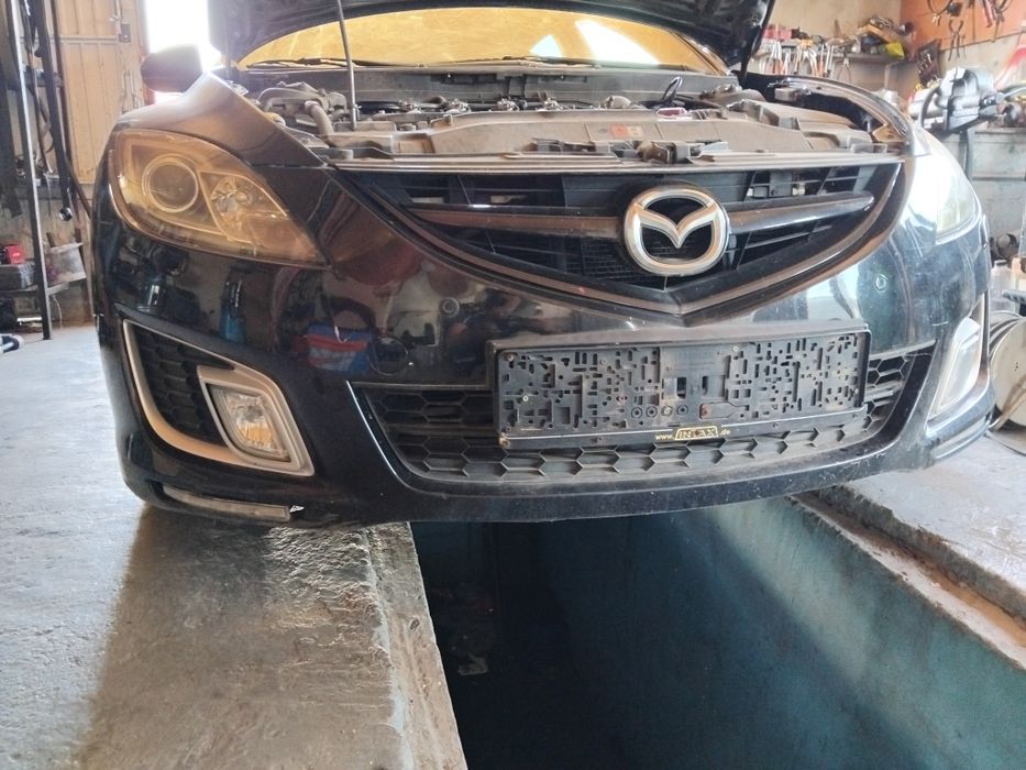 Vând faruri mazda 6 bixenon