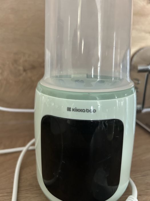 Уред за преваряване или топлене на бебешко мляко/храна