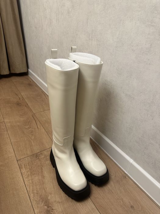 Продам сапоги новые