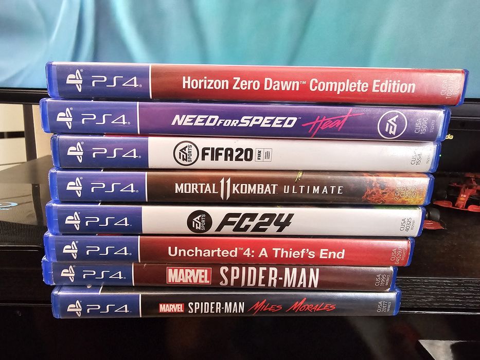 PlayStation 4 slim 1tb + 9 jocuri 2 manete