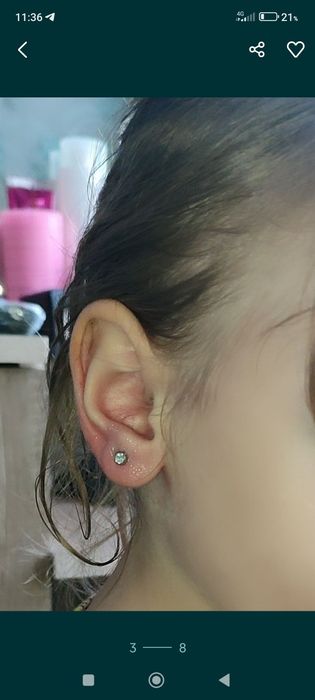 Прокалывание ушей пистолетом от Американского производителя