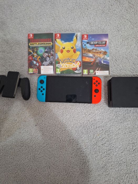 Nintendo switch OLED ca nou cu niste jocuri daca dorit