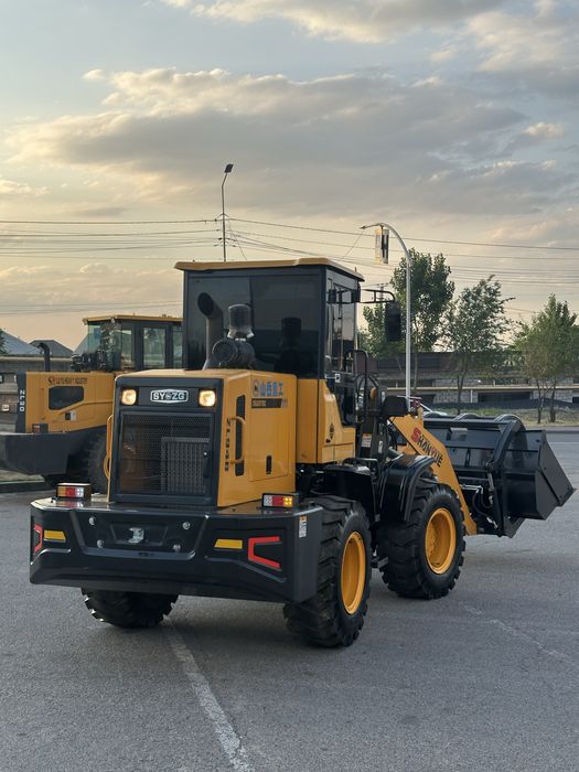 фронтальный колесный погрузчик 948