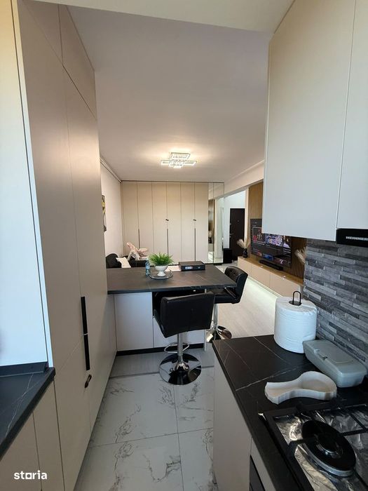 Apartament 2 camere mobilat utilat plus loc de parcare.