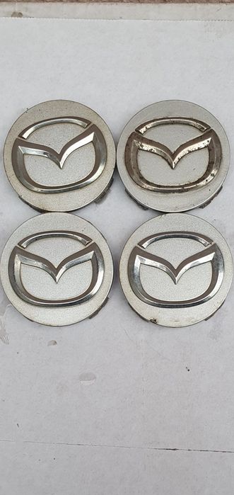 Капачки за джанти mazda оригинални капачки джснти мазда