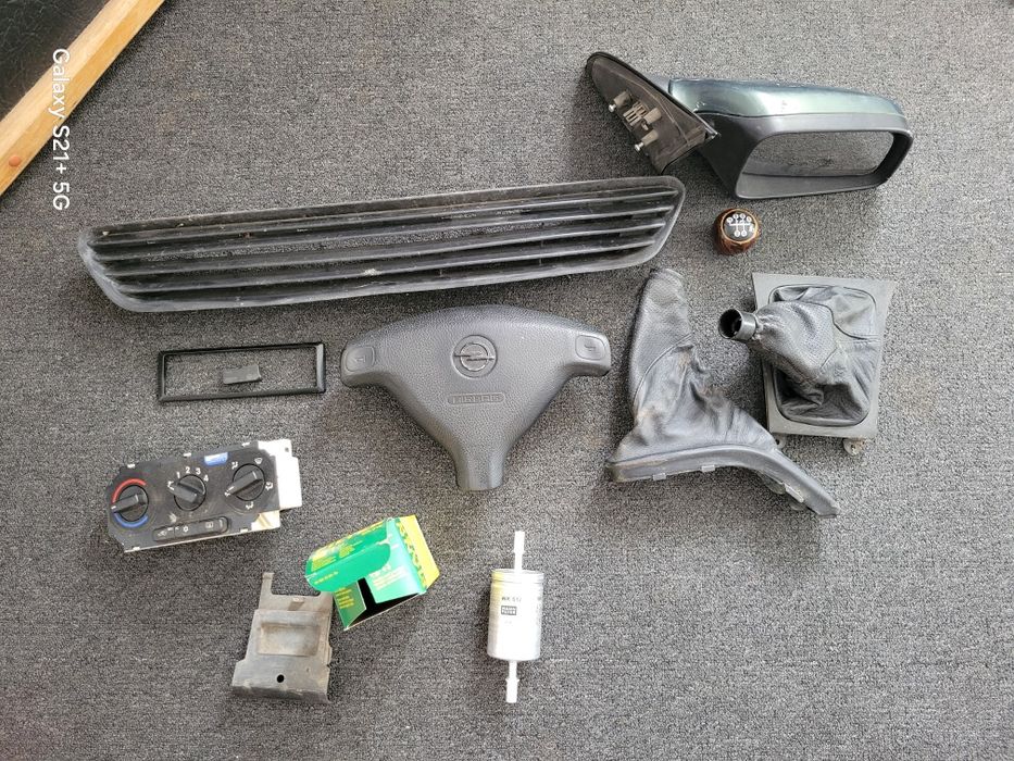 Grilă capotă, airbag volan ,panou clima ,Oglindă opel astra g