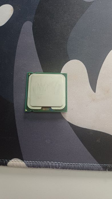 Процесор intel E 6500. Ram 2GB ,512 MB