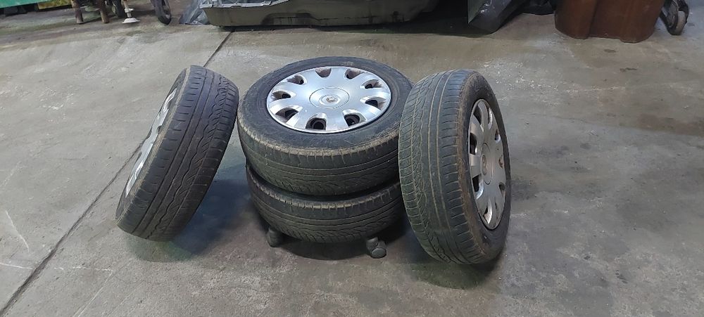 Set 4 roti vara tabla  195/65 R 15 audi vw skoda etc. cu capace originale skoda octavia 2