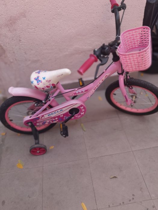 De vânzare bicicleta roz