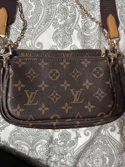 Geanta de umar Louis Vuitton