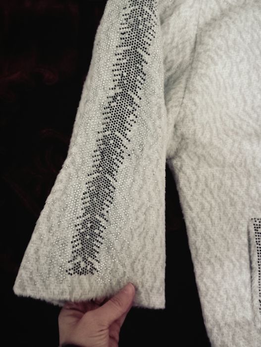 Jemfercha kardigancha jaketcha gʻalat burukcha