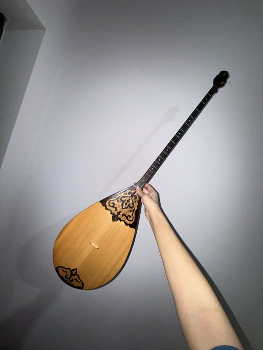 Домбыра музыкальный инструмент