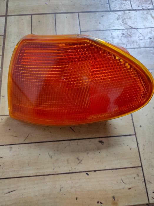 Левый поворотник на Opel Astra