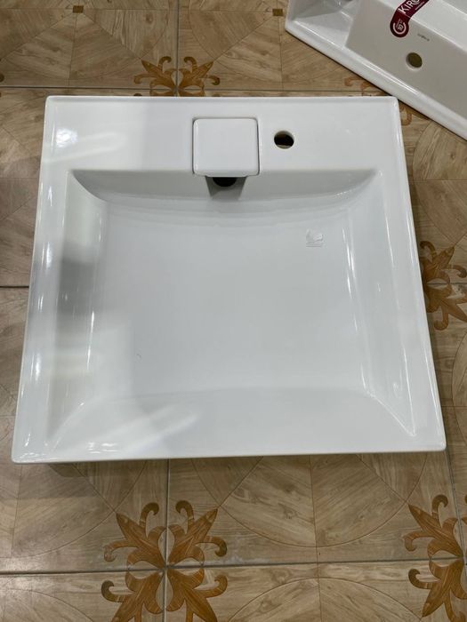 Умывальник над стиральной машиной