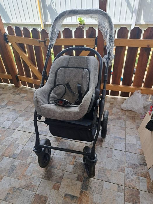 Carucior 3 în 1 Krausman, gri
Scoica a fost folosită mai mult, c