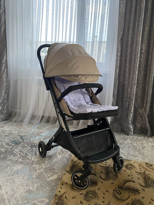 Детская коляска и стульчик