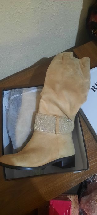 Yengi firmenniy obuvla 100 min som