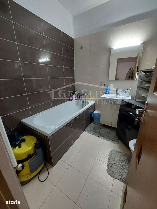 Apartament 2 dormitoare 1 Open-space Parcare privată extra