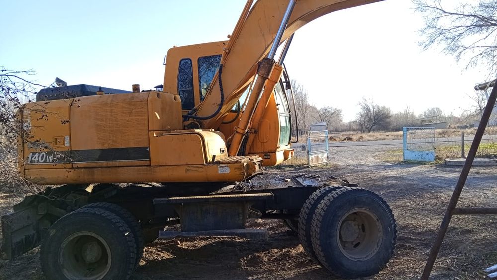 Экскаватр Хундай 140w