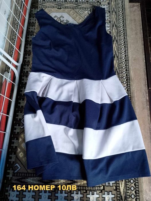 Дрехи за момиче якета рокли сака гащеризон 164 размер