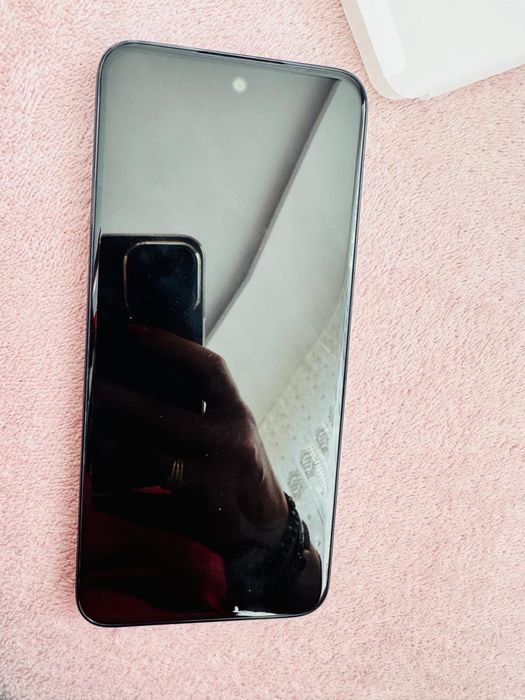 Телефон TCL 605.