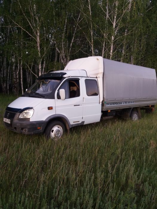 Перевозки .услуги .Грузчики. погрузчик 2 кубовый .