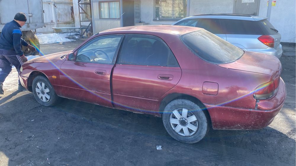 Мазда кронс машина