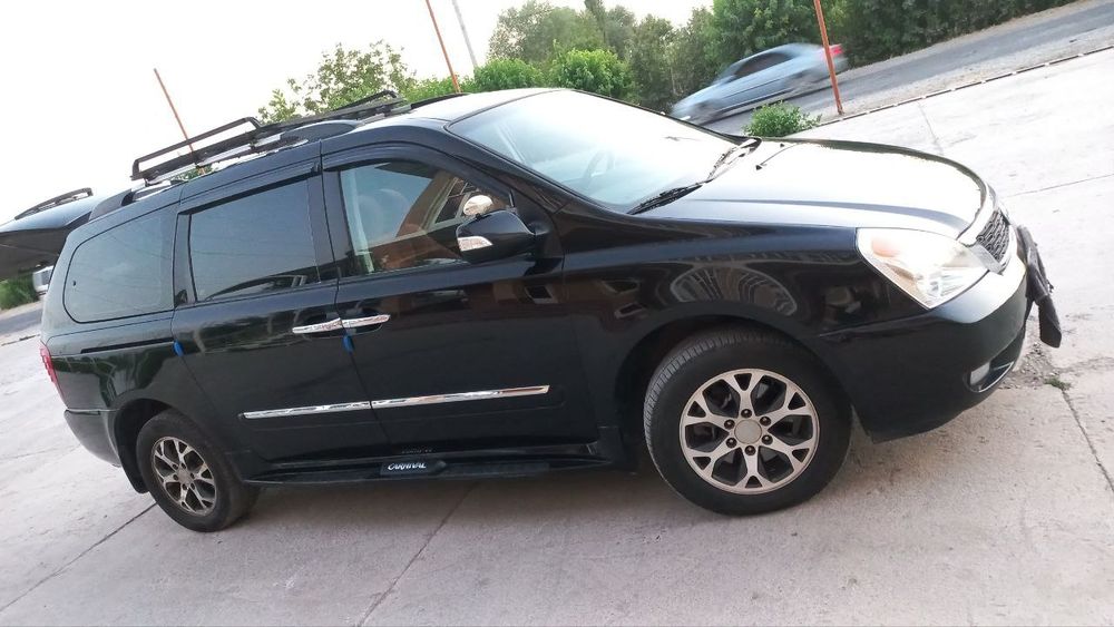 Kia carnival. 2011-yil.  4ta yangi balon.
