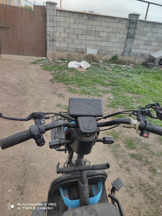 Трицикл скутер а