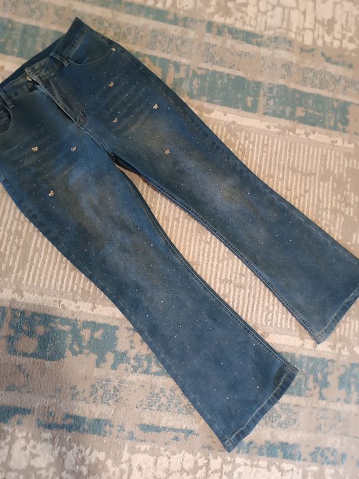 Джинсы клёш новые