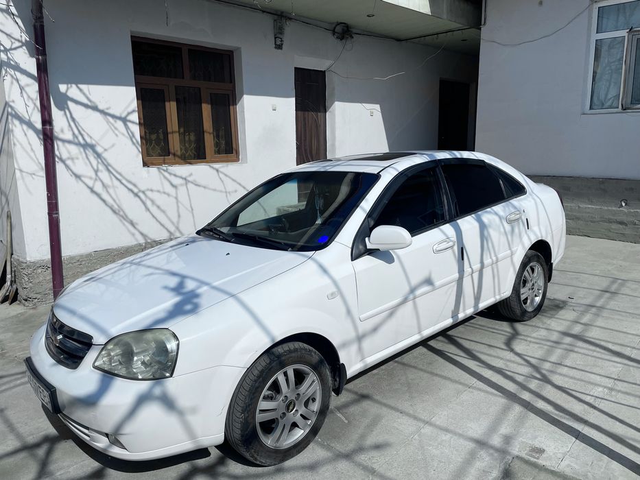 Lasetti 1.8 avtomat 2009 yil gaz