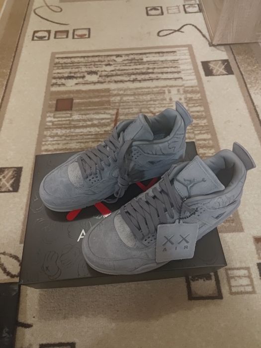 KAWS x Air Jordan 4 Retro Cool Grey